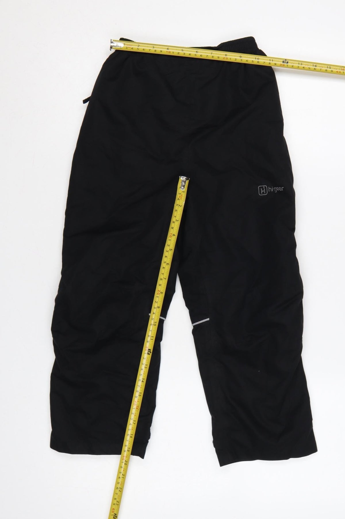 Close-up detail of Higar boys’ black 8 years snow pants reflective padded ski trousers