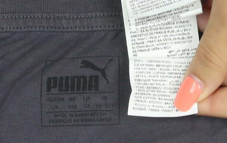Brand and care label for Puma girls’ grey pink logo graphic t-shirt, size 8, years short sleeve