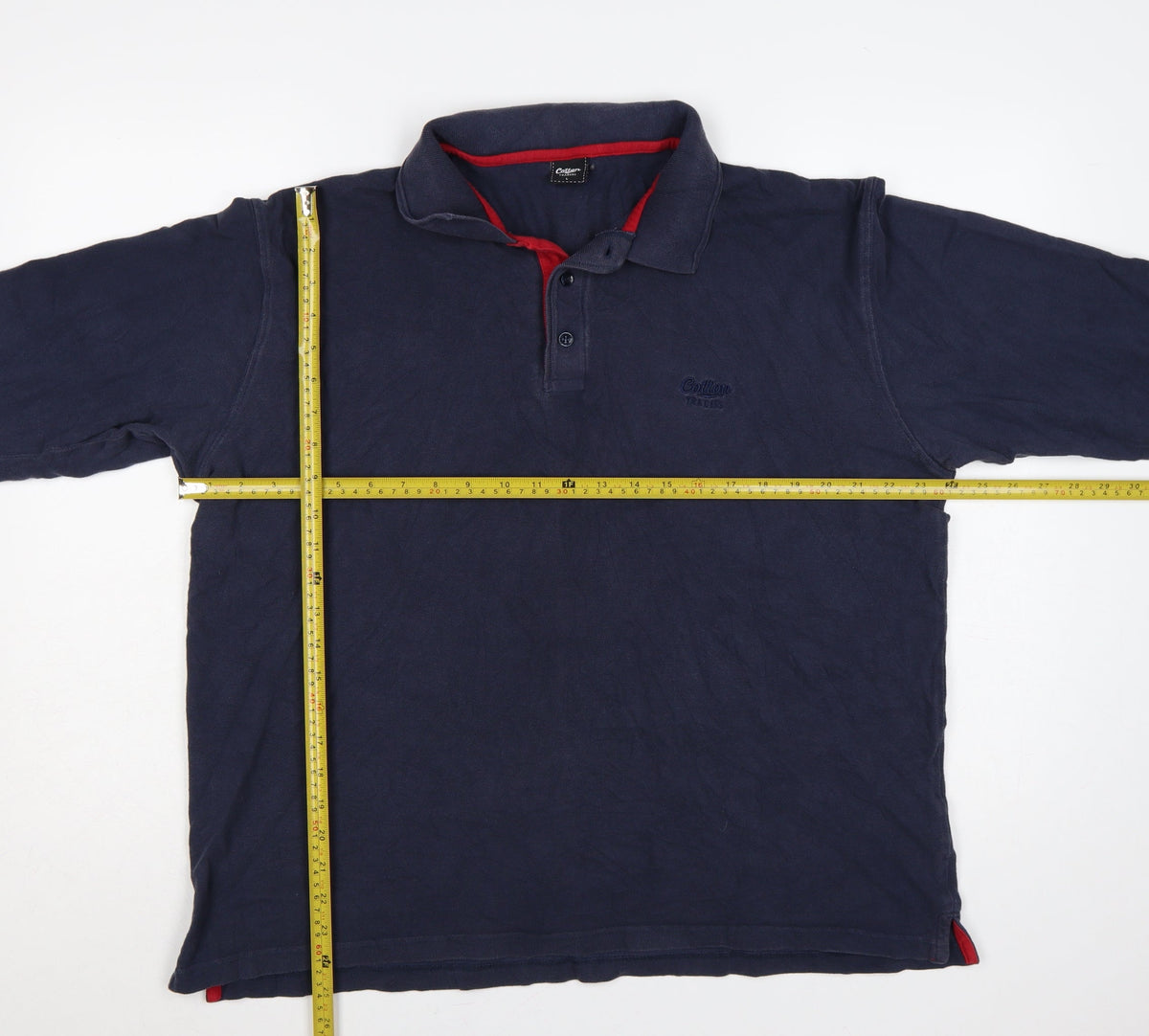 Close-up detail of Cotton Traders Men’s Blue L Long Sleeve Polo Shirt Logo
