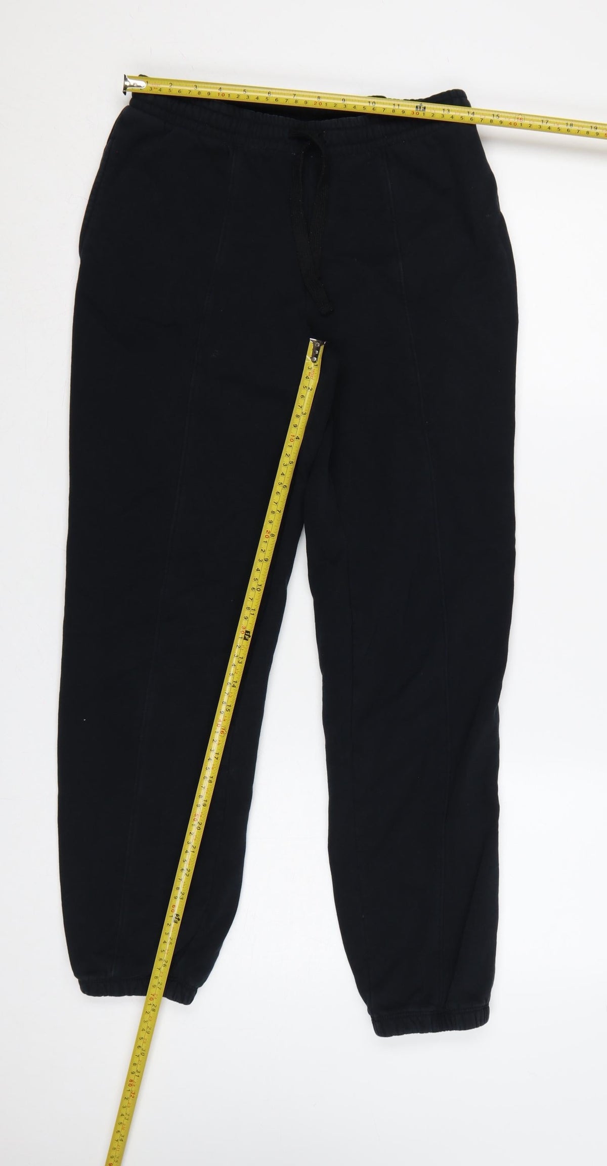 Close-up detail of Champion Men’s Black M Jogger Sweatpants Drawstring Logo Cuffed