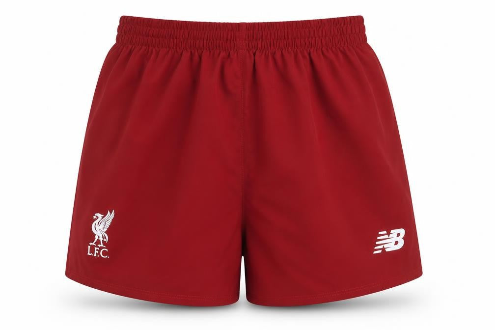 Front view of New Balance boys’ red 6-7 years athletic liverpool fc football shorts