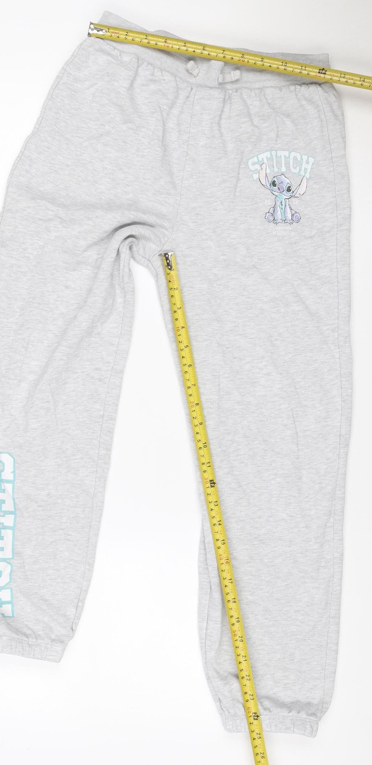 Close-up detail of Disney girls’ grey 12 years stitch sweatpants joggers cotton blend