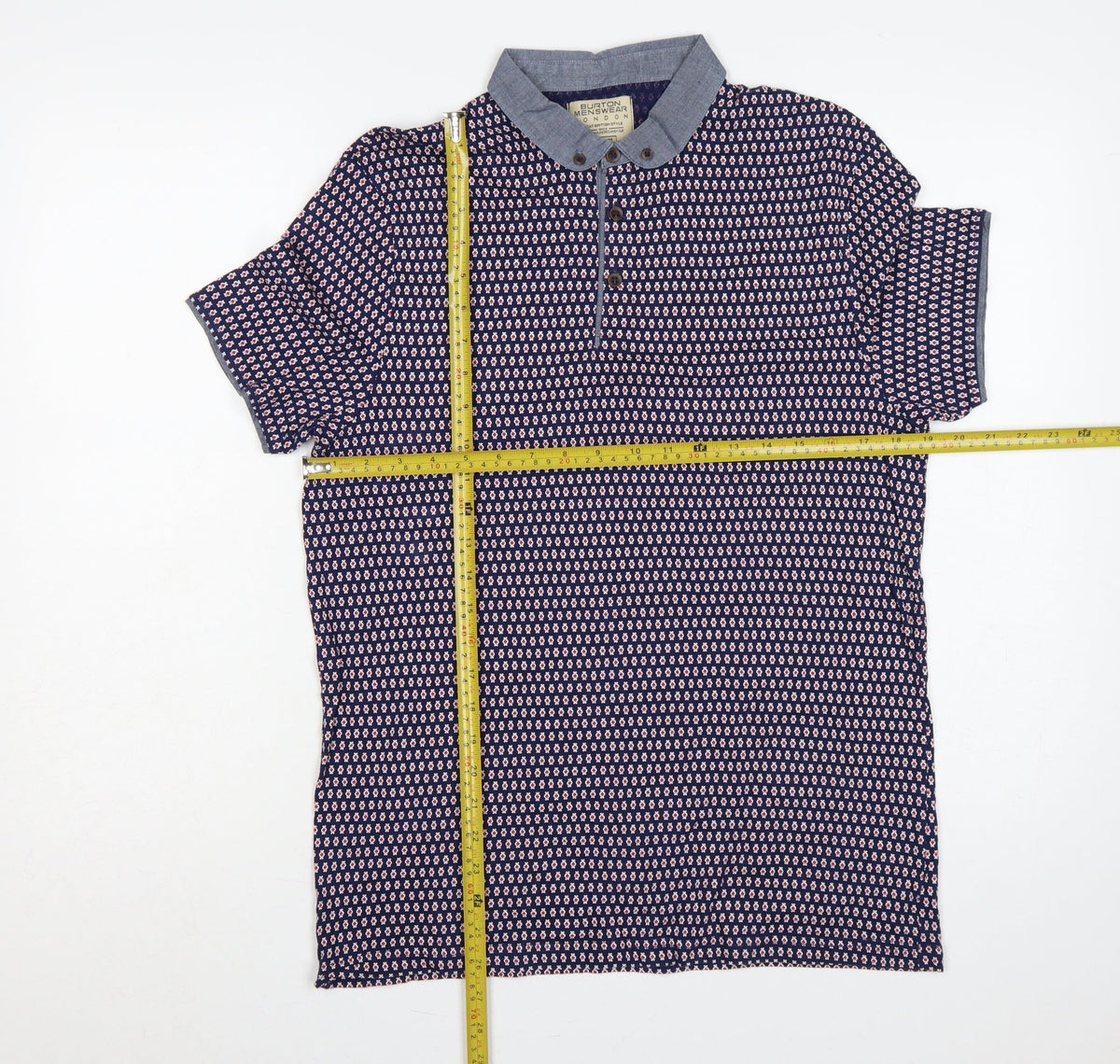 Close-up detail of Burton Menswear London Men's Blue Geometric Print Button-Down Polo M