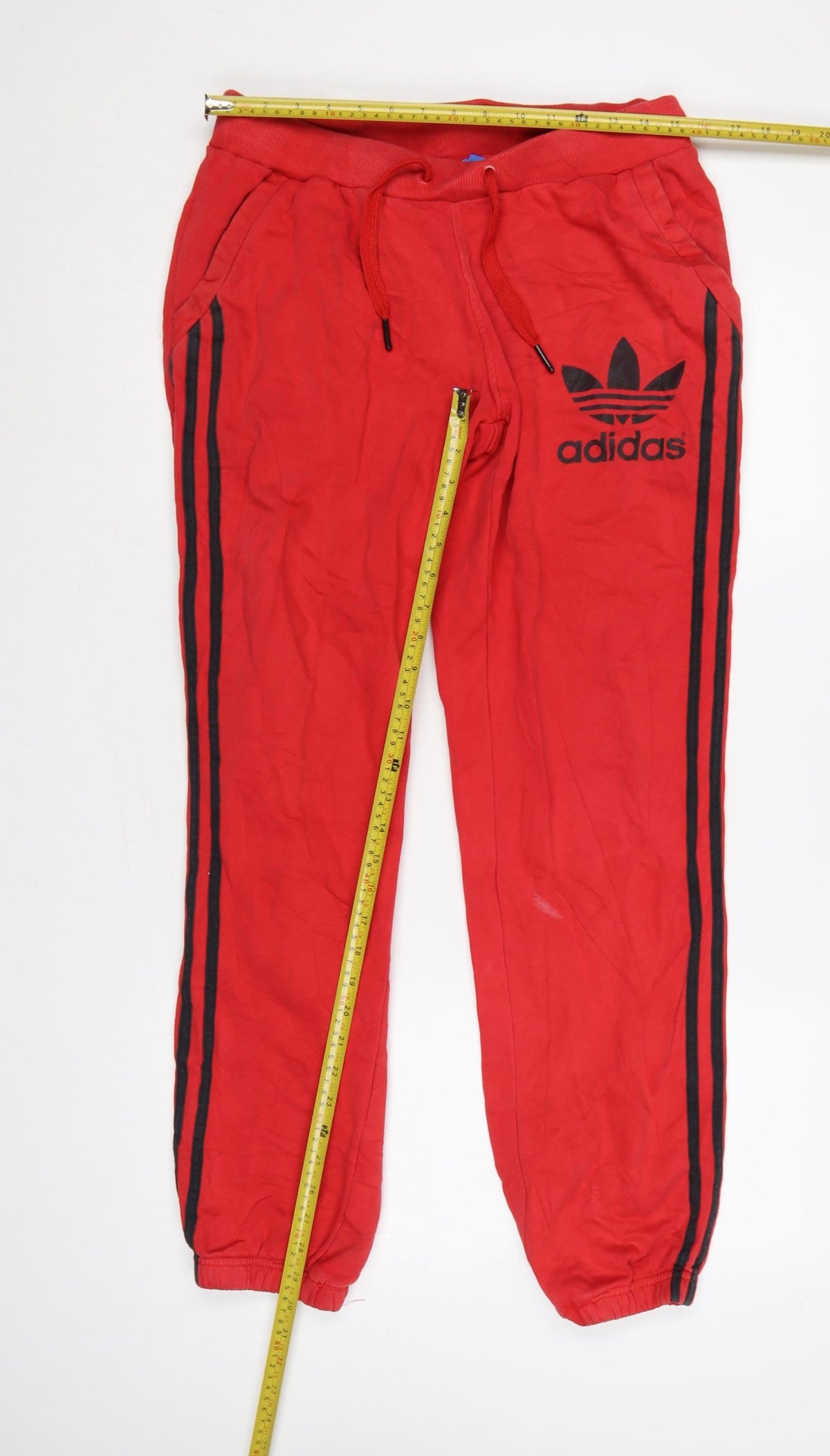 Close-up detail of Adidas Men Red M Trefoil 3 Stripe Fleece Jogger Sweatpants