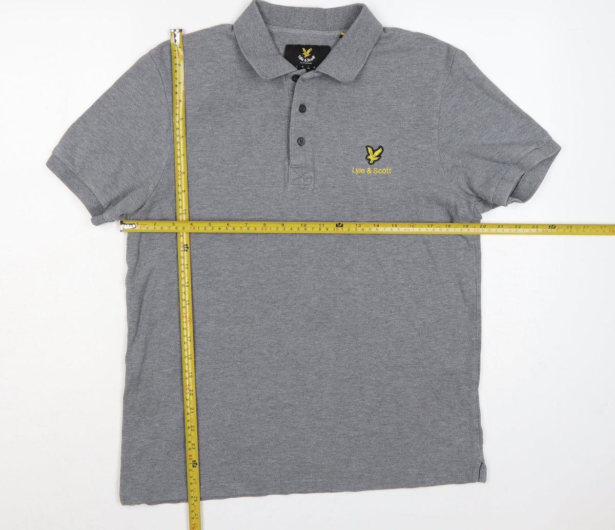 Close-up detail of Lyle & Scott men’s grey logo short sleeve polo shirt, size L