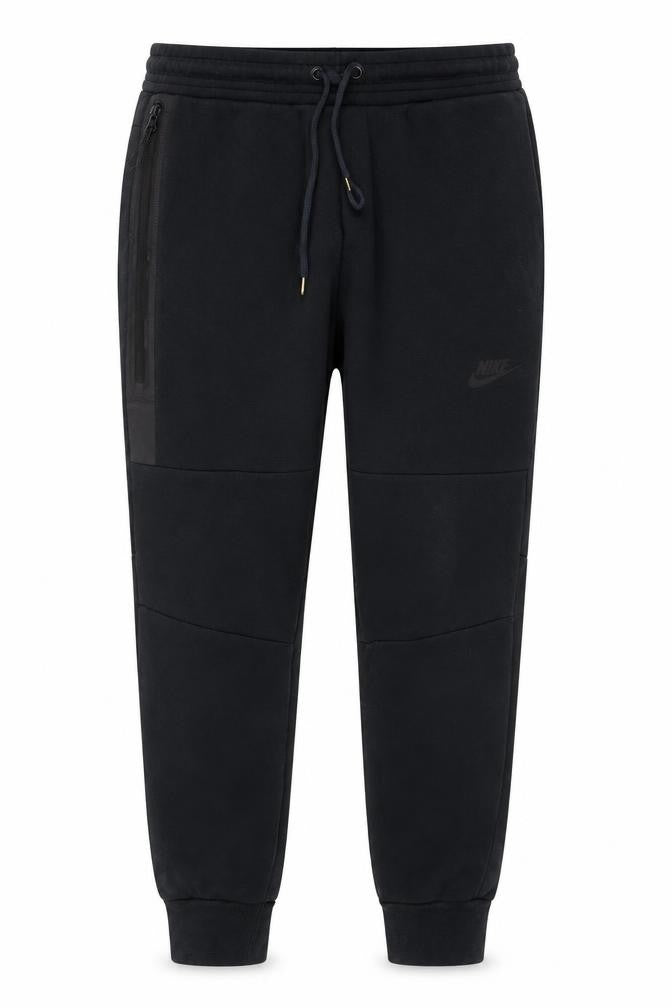 Front view of Nike boys’ black s tech fleece jogger trousers drawstring zip pocket