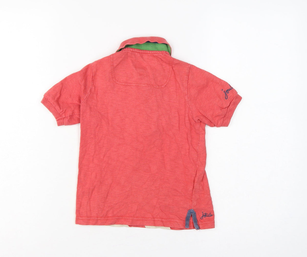 Brand and care label for Tom Joule boys’ red 4 years striped logo crest short sleeve polo shirt