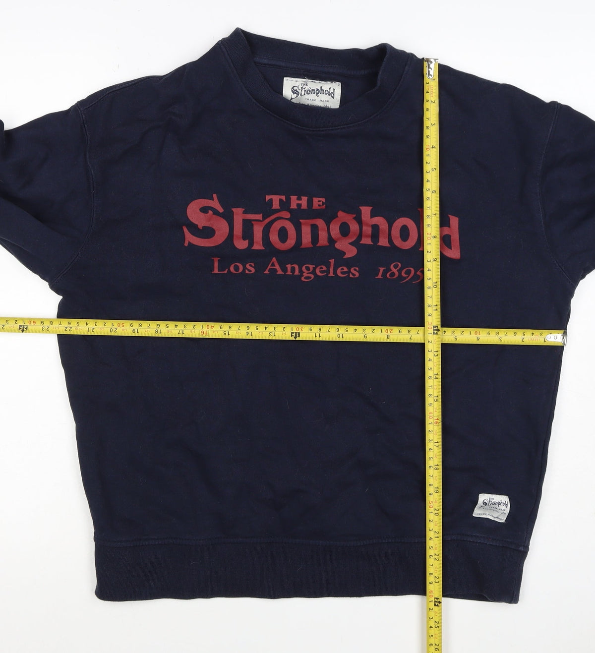 Brand and care label for Stronghold Men's Navy M Graphic Print Los Angeles Pullover Sweatshirt