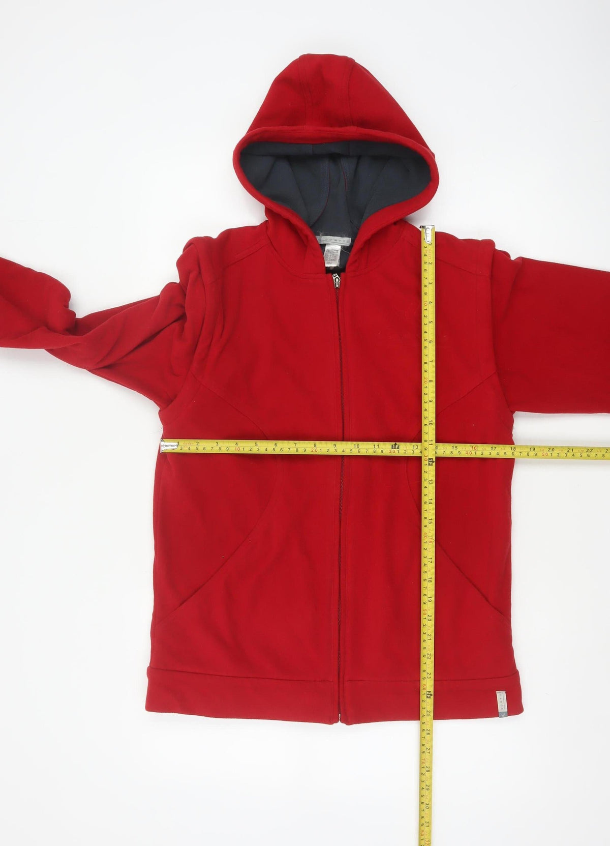 Close-up detail of Domyos boys’ red 14 years hooded full zip fleece jacket sports