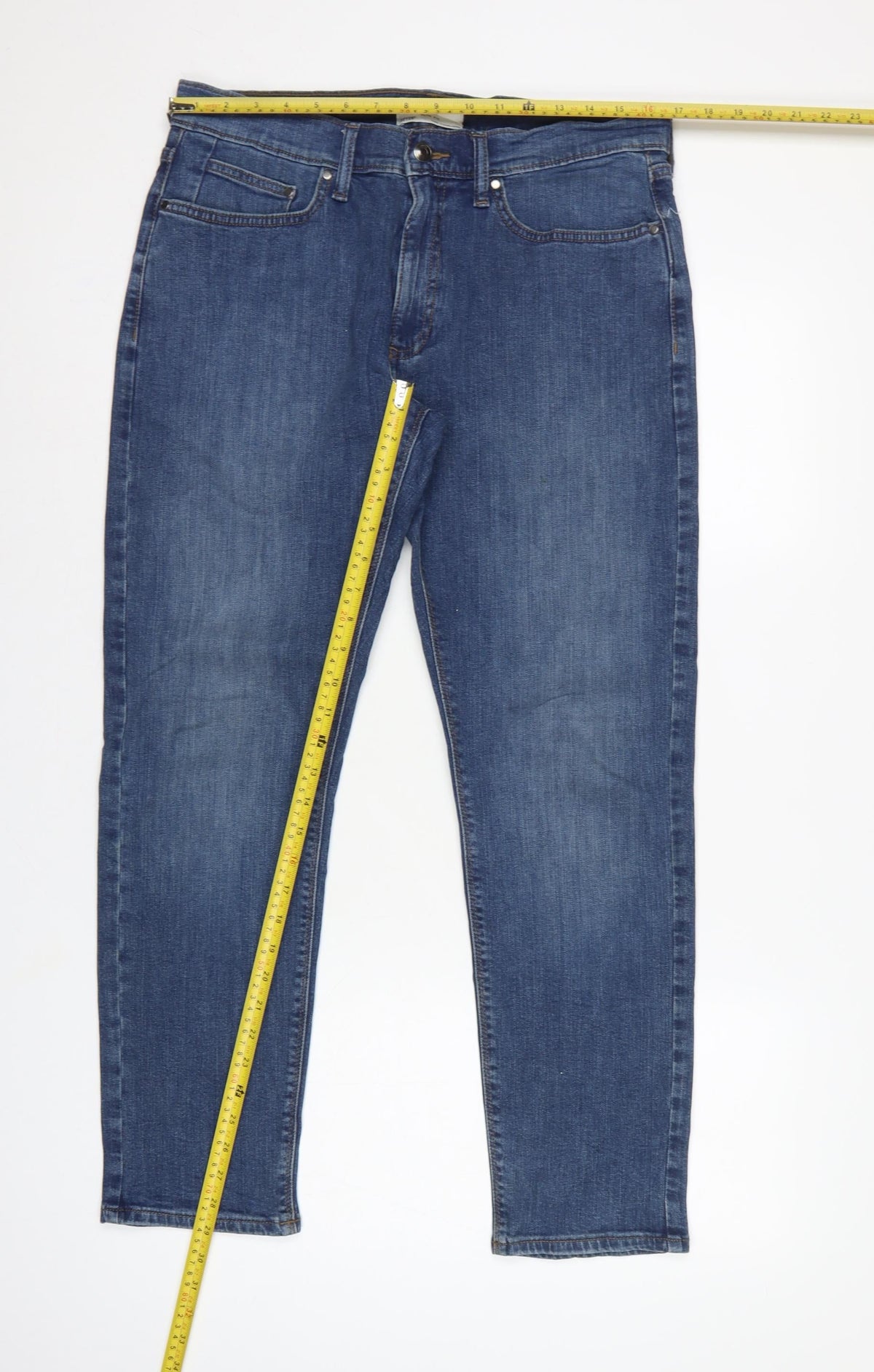 Close-up detail of M&S Men’s Blue 32W 29L Slim Fit Tapered 5-Pocket Jeans