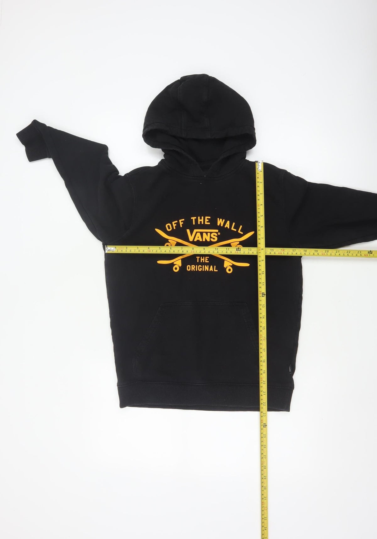 Close-up detail of Vans boys’ black large hooded pullover jacket skate logo cotton blend