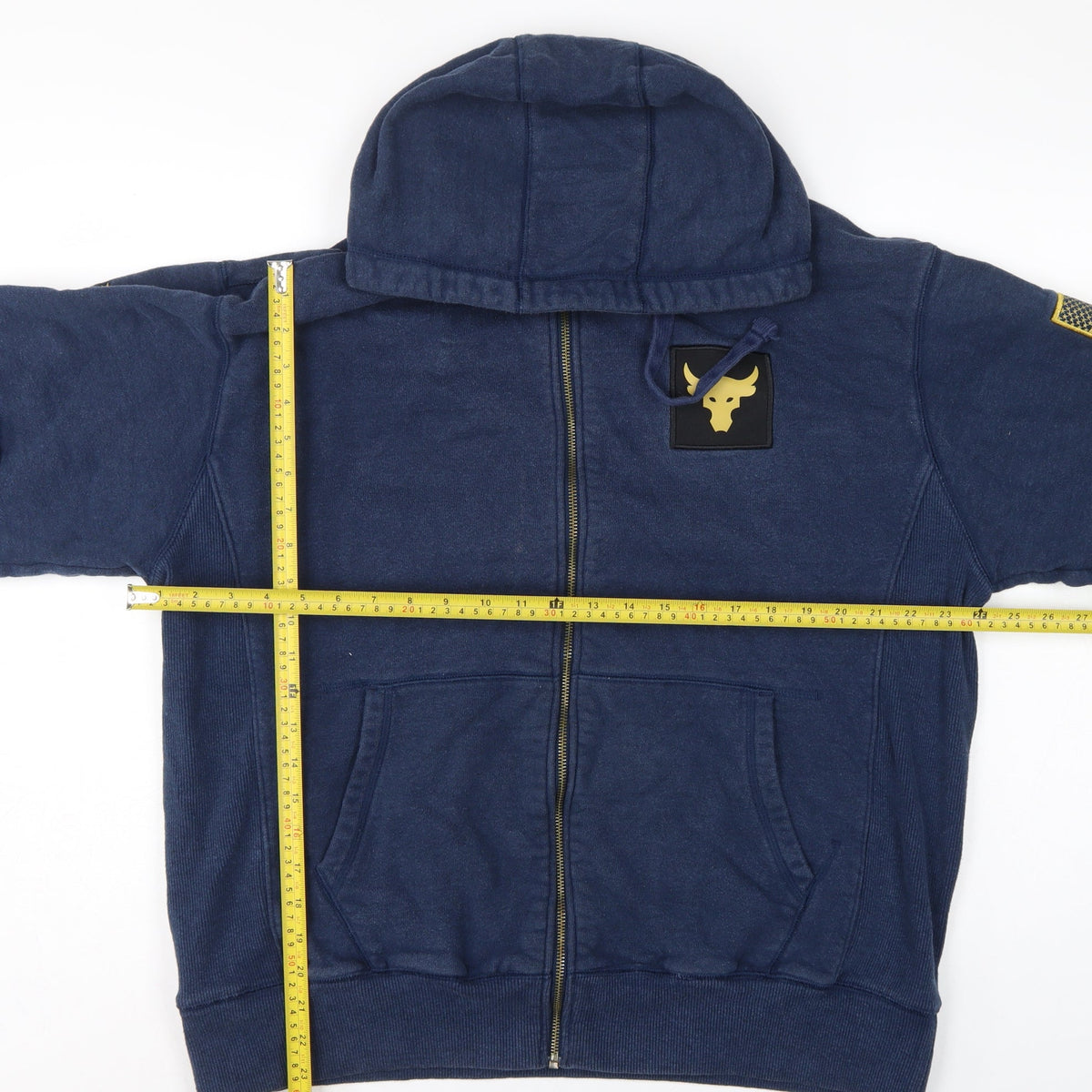Close-up detail of Under Armour Men’s Blue L Project Rock Full Zip Hoodie USA Flag