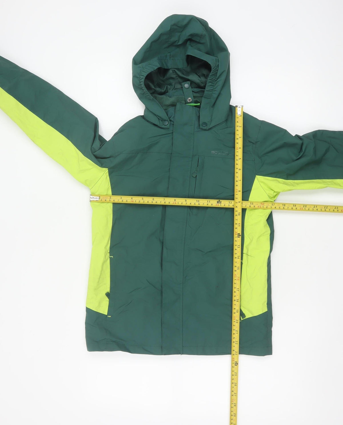 Close-up detail of Mountain Warehouse boys’ green 11-12 years ski jacket hooded colourblock