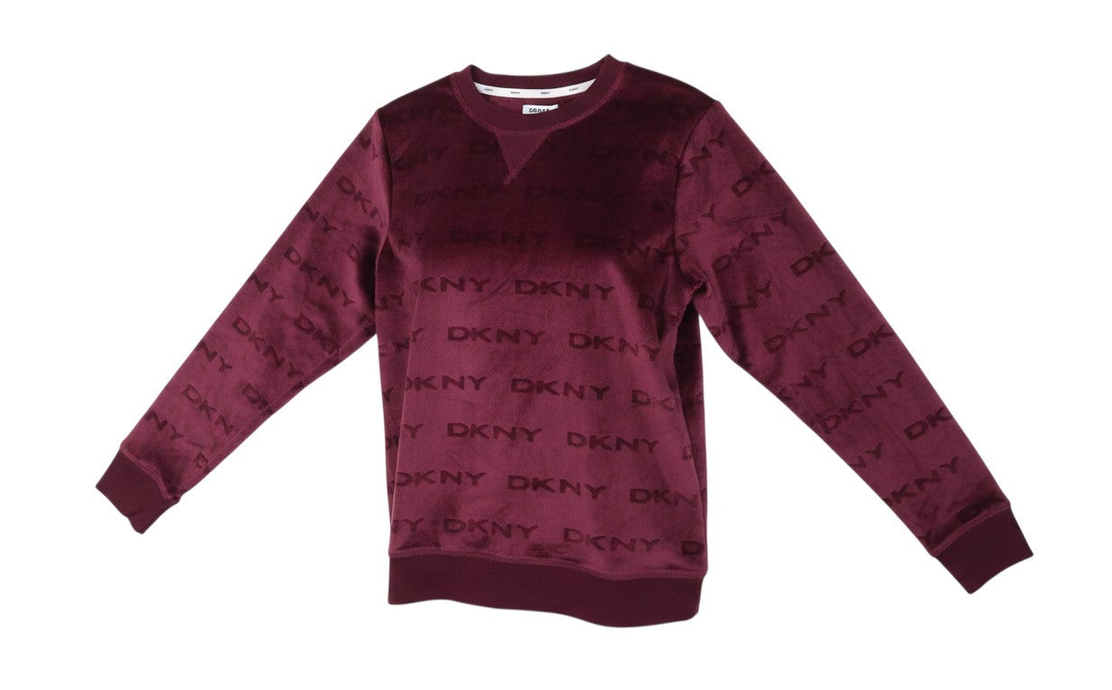 Prewornwholesale burgundy velour pullover sweatshirt with all-over DKNY logo print, crew neck, and ribbed cuffs.